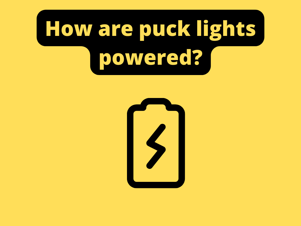 How are puck lights powered?